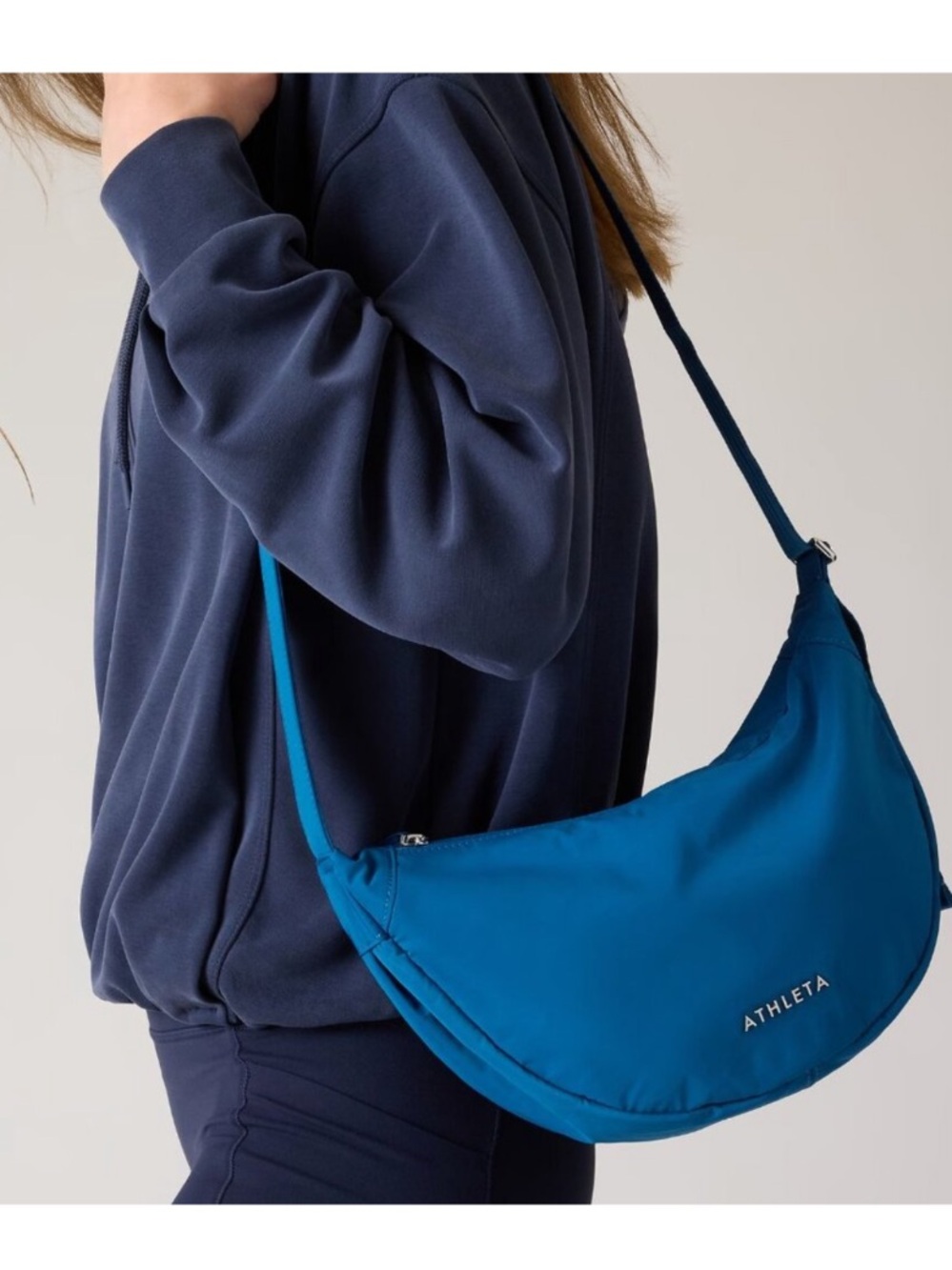 Athleta All About Crossbody Deep Lapis Blue Crescent Bag. Everyday essentials